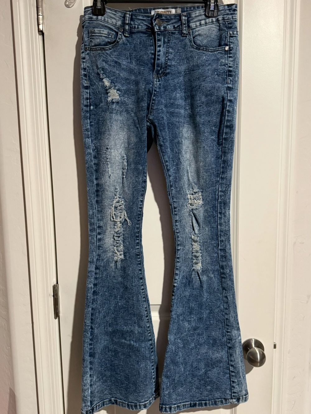 Women's Distressed Flare Jeans in Washed Blue
